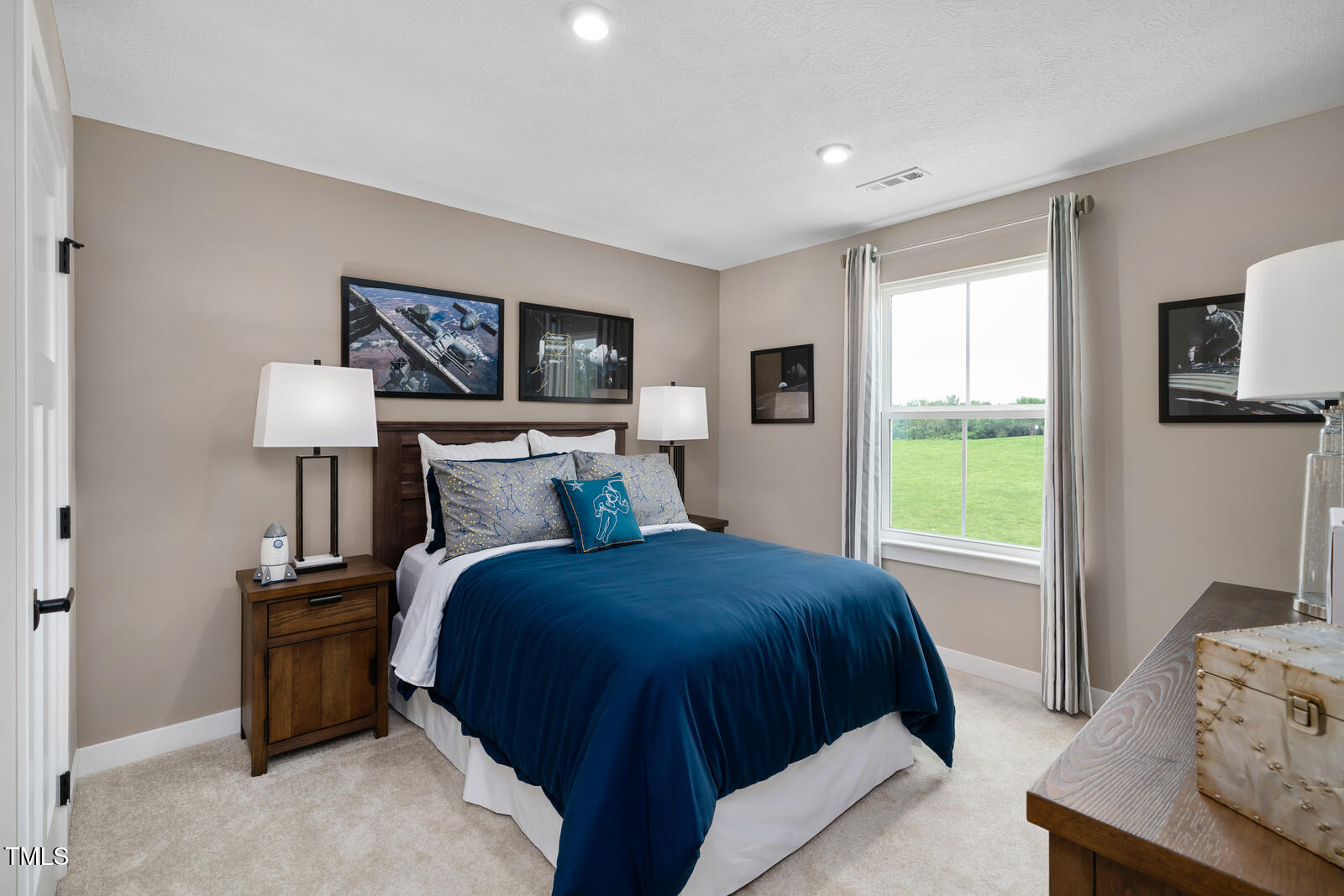 805 Walker Rdg Way Willow Spring, NC 27592 - Photo 25 of 29 a bedroom with a bed and wooden floor