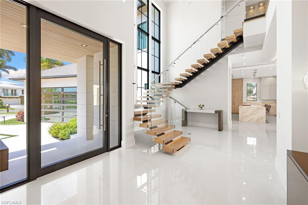 2345 Tarpon Road Naples, FL 34102 - Photo 3 of 43 Foyer with a high ceiling and recessed lighting