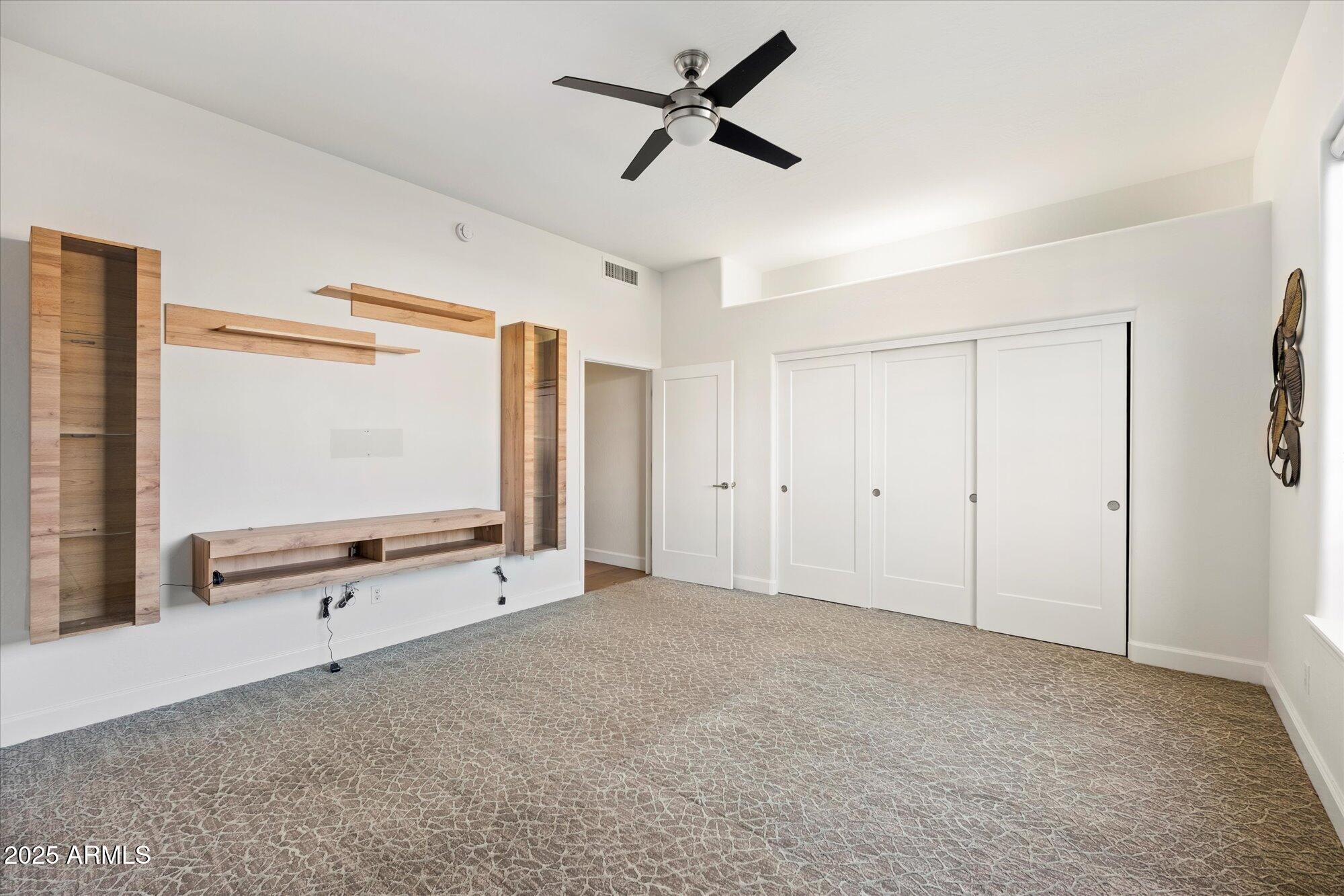 11 West San Juan Avenue Phoenix, AZ 85013 - Photo 27 of 40 a view of an empty room with a window