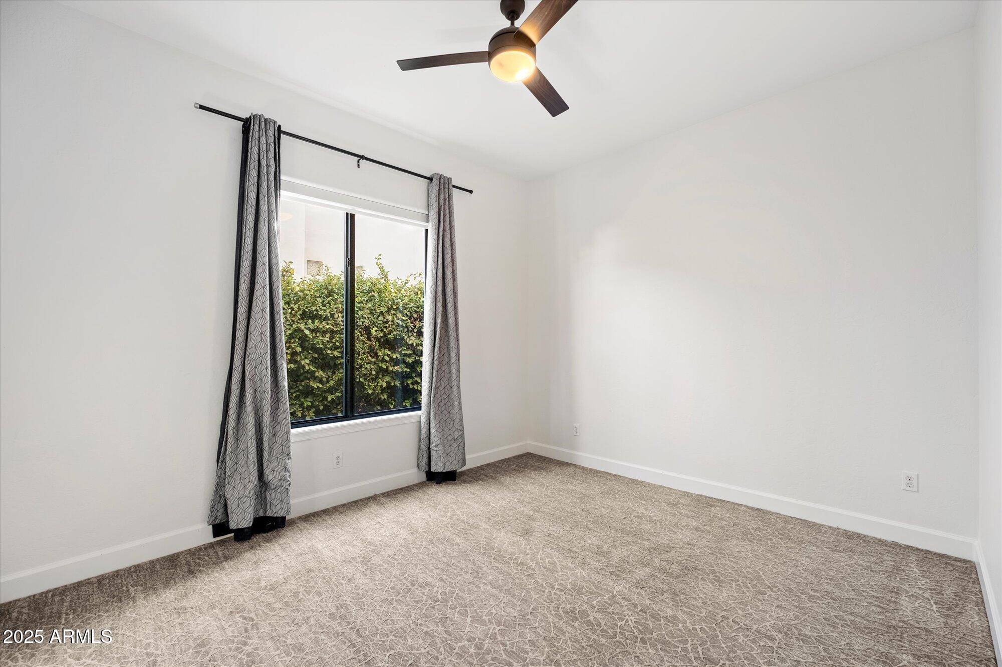 11 West San Juan Avenue Phoenix, AZ 85013 - Photo 30 of 40 an empty room with a window