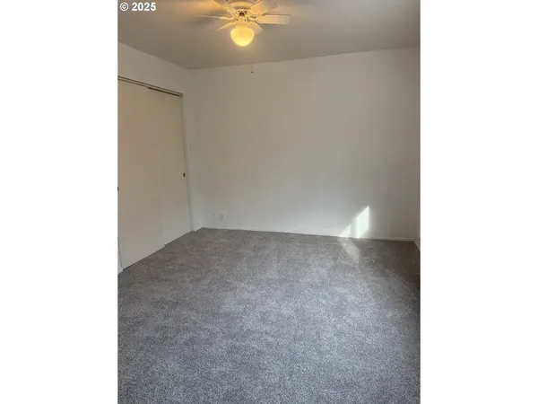 a view of a room with an empty space