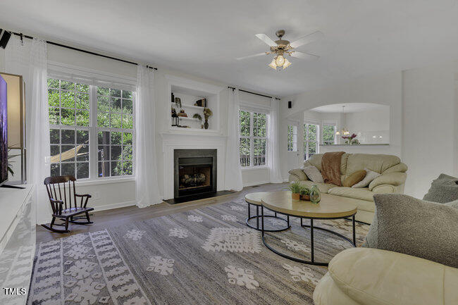 133 Pasadena Road Garner, NC 27529 - Photo 3 of 39 a living room with furniture and a fireplace