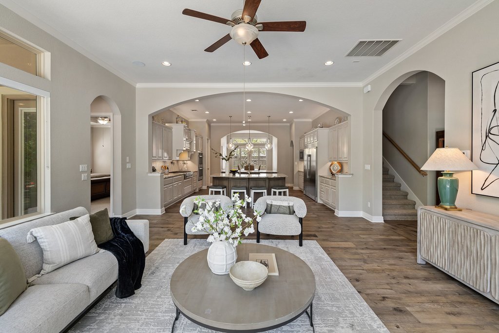 108 Berry Cove Georgetown, TX 78628 - Photo 10 of 39 a living room with furniture and a chandelier