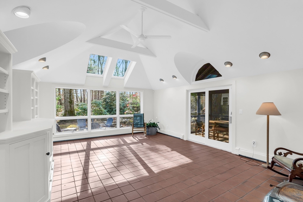 70 Middle Street Lexington, MA 02421 - Photo 14 of 37 a view of an empty room with wooden floor and a window