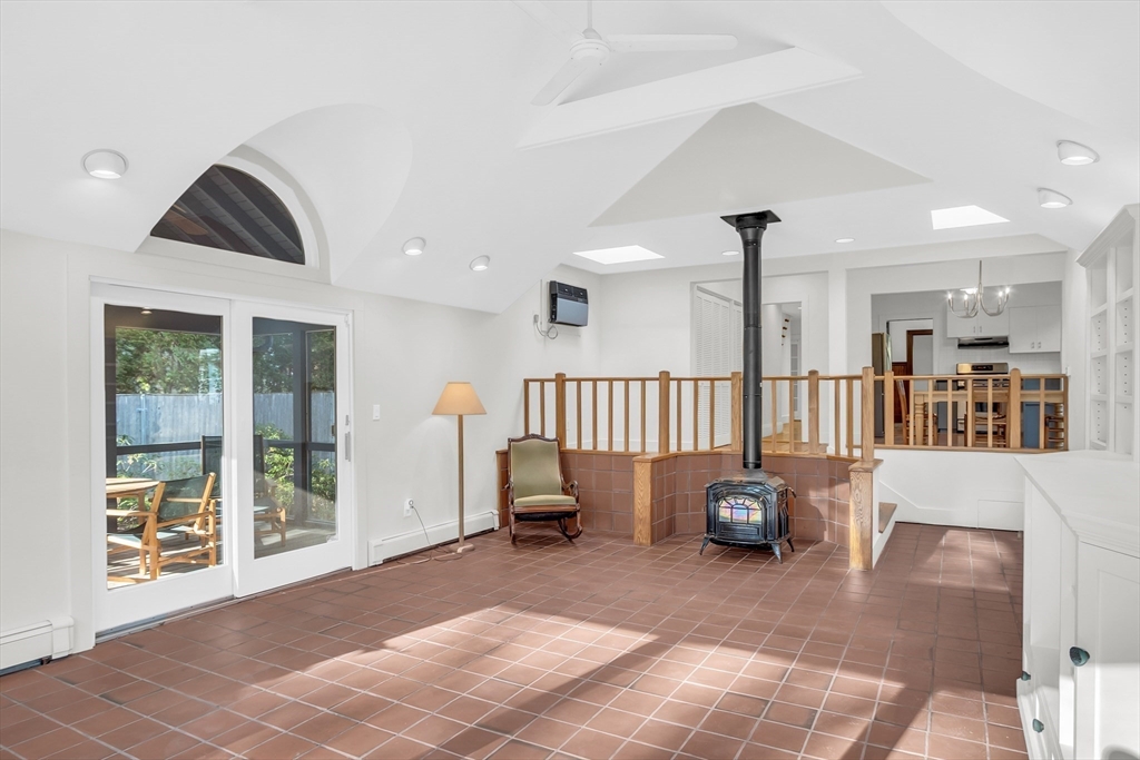 70 Middle Street Lexington, MA 02421 - Photo 15 of 37 a living room with furniture and a window