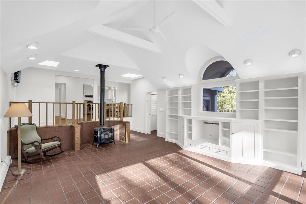 70 Middle Street Lexington, MA 02421 - Photo 16 of 37 a living room with furniture and a table