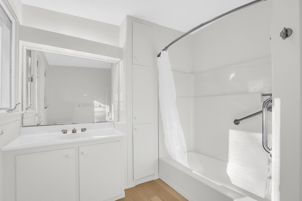 70 Middle Street Lexington, MA 02421 - Photo 24 of 37 a bathroom with a bathtub and a sink