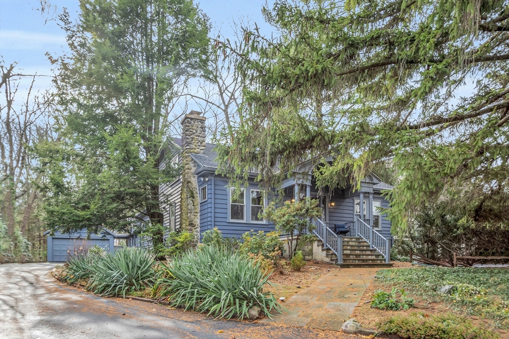 70 Middle Street Lexington, MA 02421 - Photo 34 of 37 a front view of a house with garden