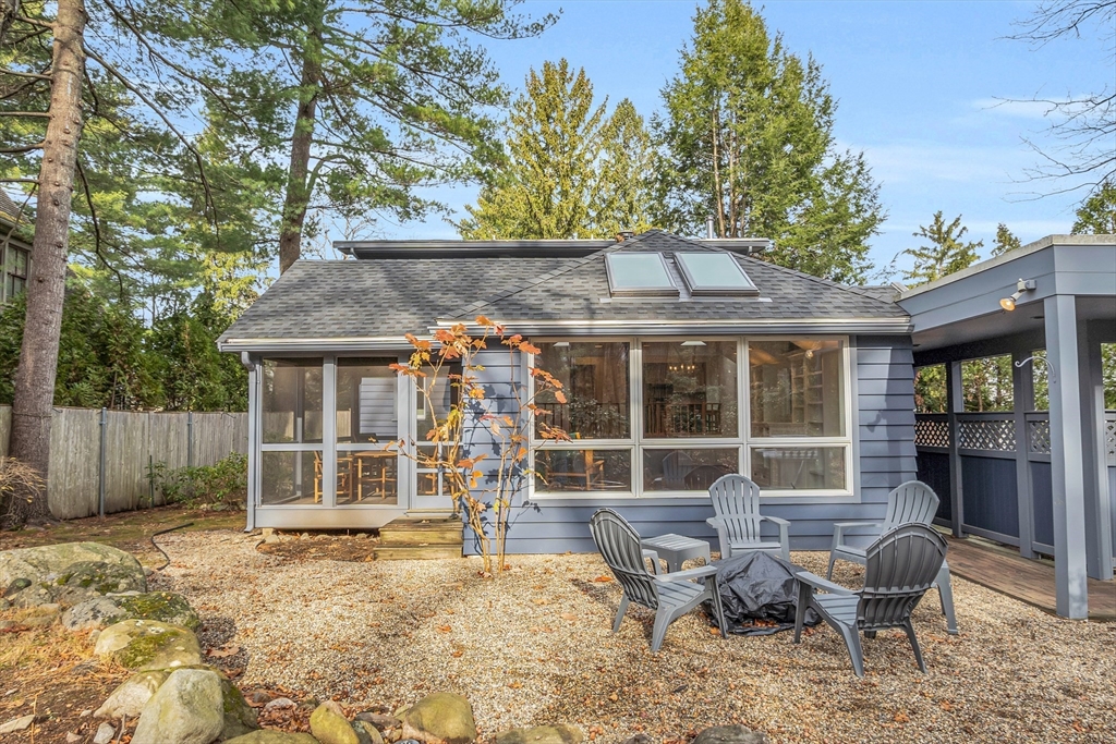 70 Middle Street Lexington, MA 02421 - Photo 36 of 37 a backyard of a house with seating space
