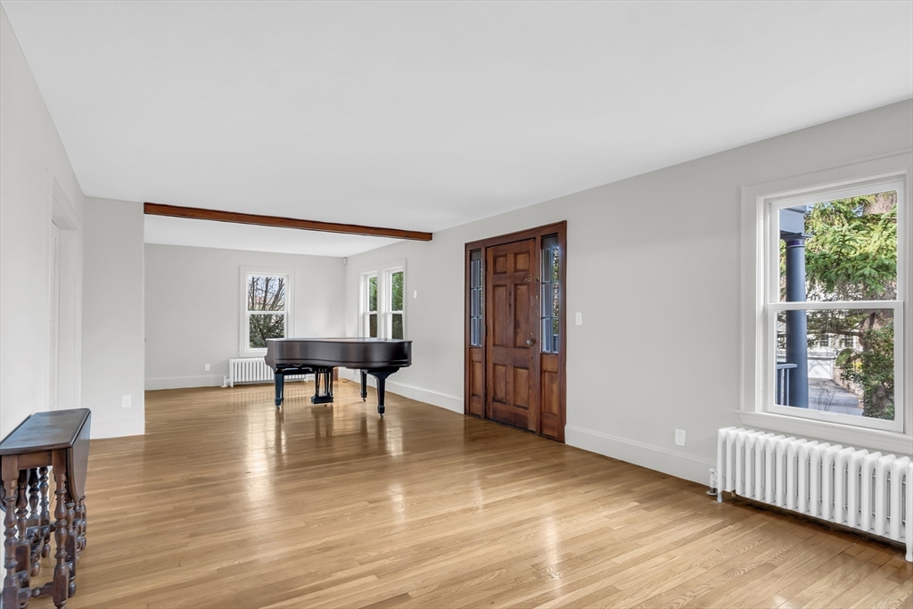 70 Middle Street Lexington, MA 02421 - Photo 6 of 37 a dining room with furniture and wooden floor