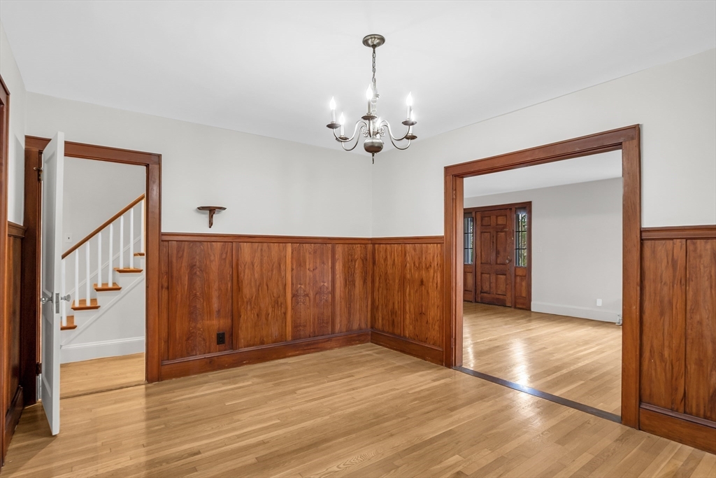 70 Middle Street Lexington, MA 02421 - Photo 7 of 37 a view of an empty room with window and wooden floor