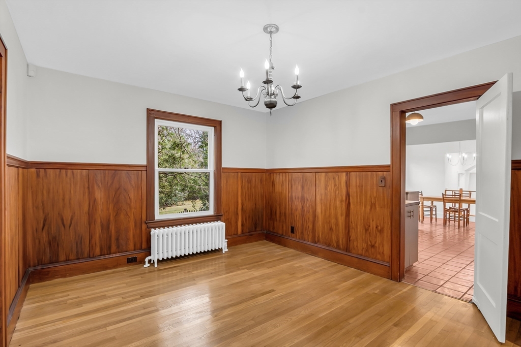 70 Middle Street Lexington, MA 02421 - Photo 8 of 37 wooden floor in an empty room with a window