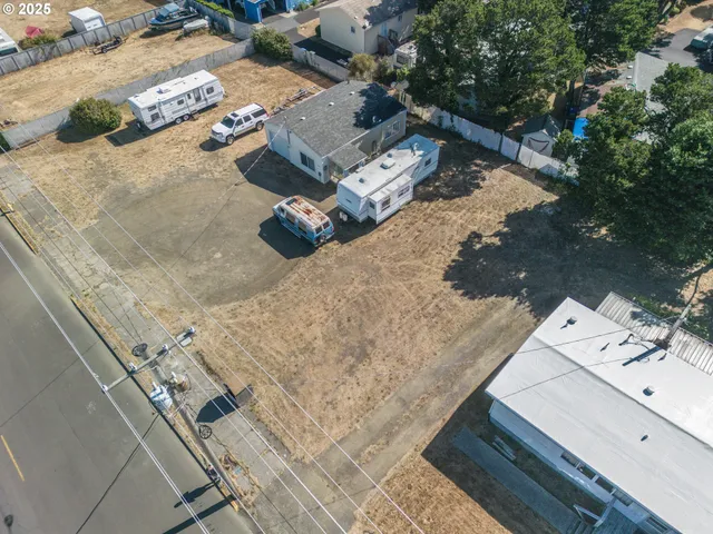 an aerial view of residential house with outdoor space