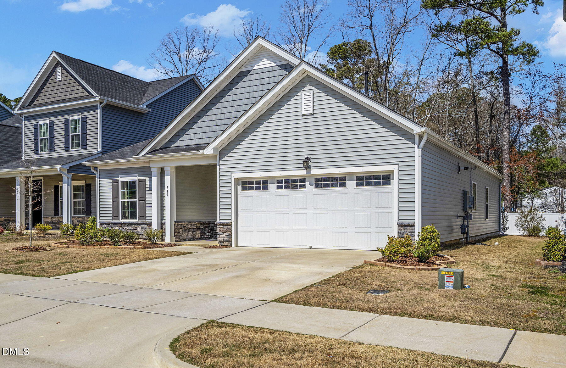 244 Chateau Way Angier, NC 27501 - Photo 3 of 30 a front view of a house with a yard