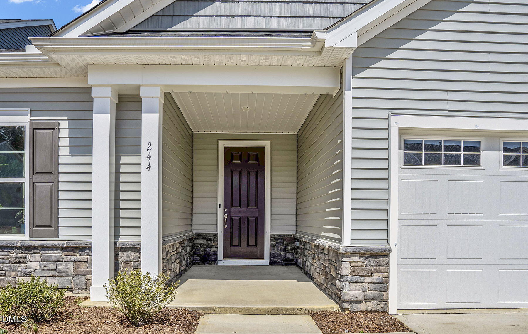 244 Chateau Way Angier, NC 27501 - Photo 4 of 30 a front view of a house with a garden