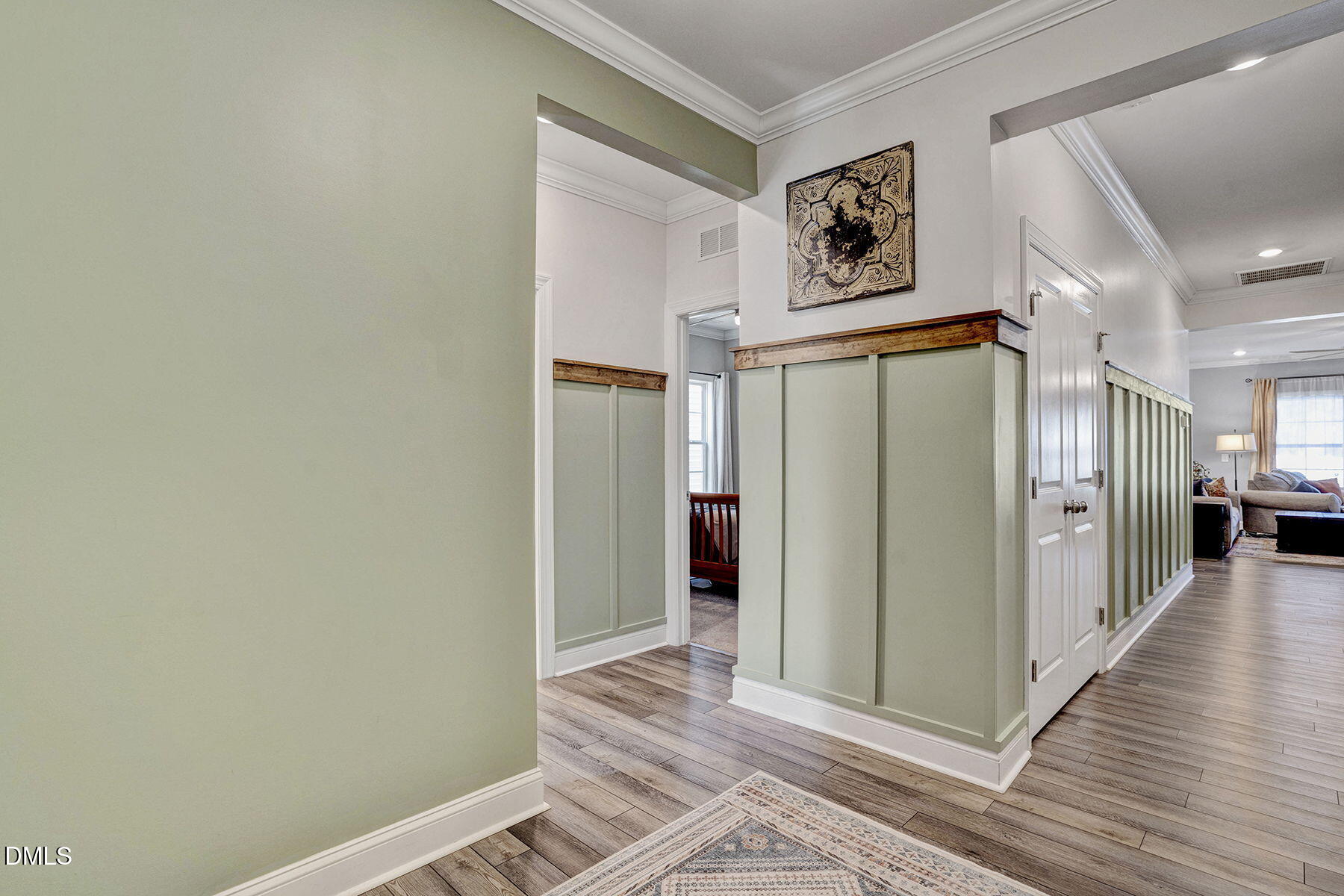 244 Chateau Way Angier, NC 27501 - Photo 5 of 30 a view of a hallway with wooden floor