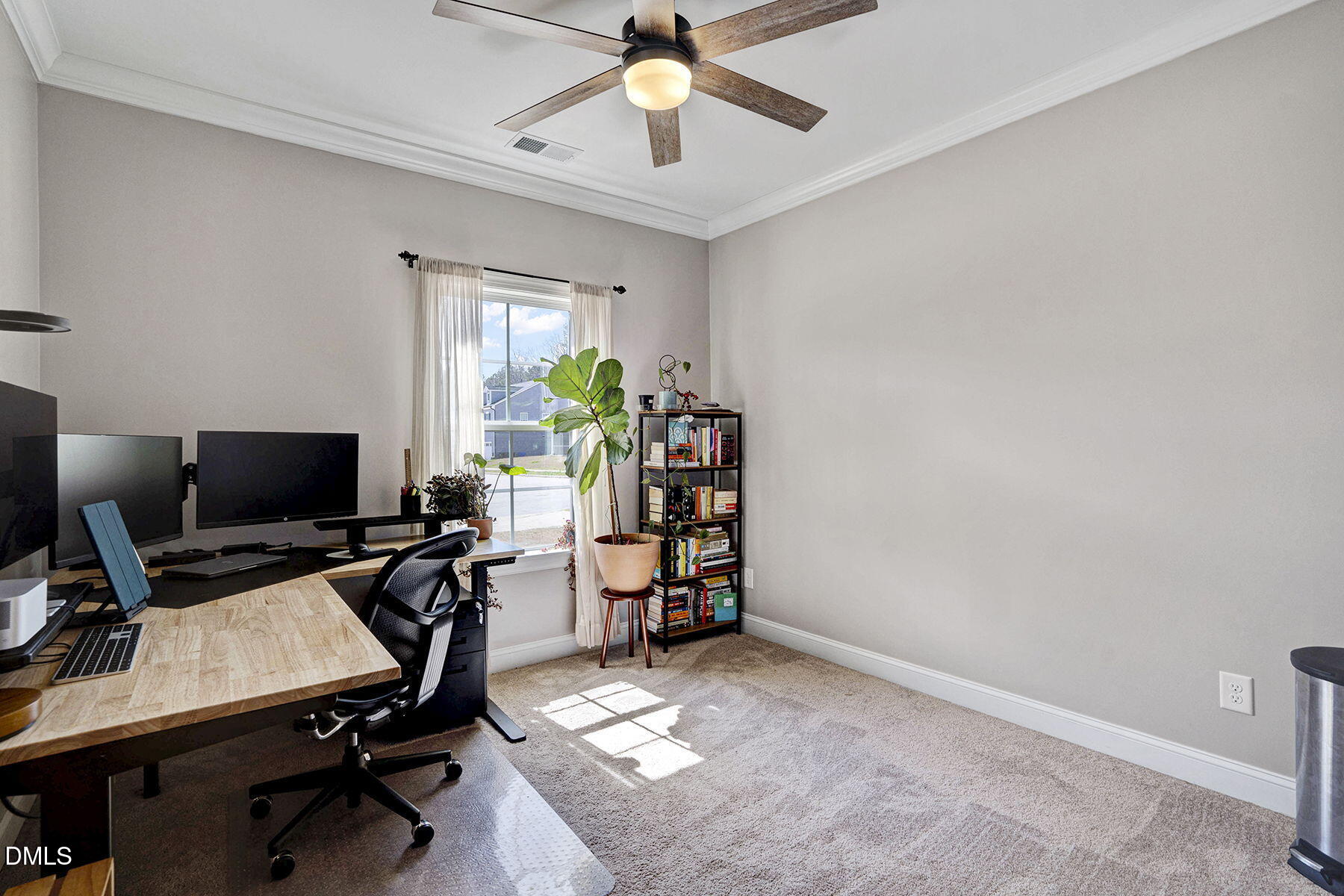 244 Chateau Way Angier, NC 27501 - Photo 6 of 30 a view of a workspace with furniture and a window