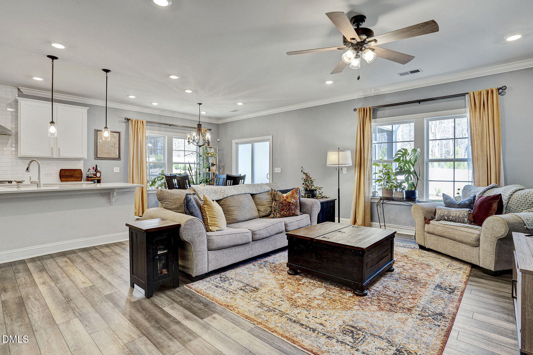 244 Chateau Way Angier, NC 27501 - Photo 10 of 30 a living room with furniture and a large window
