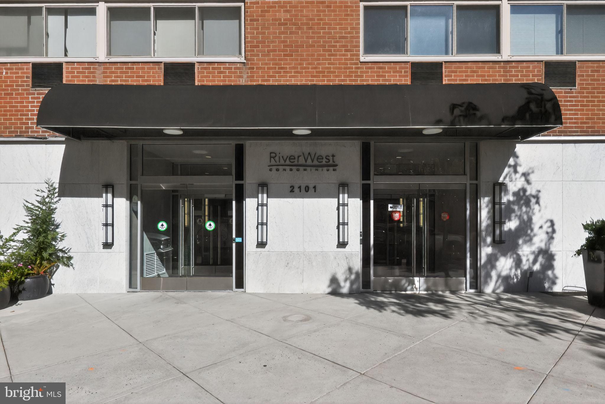 2101-17 Chestnut Street, Unit 1121 Philadelphia, PA 19103 - Photo 1 of 42 a front view of a building with traffic signal lights