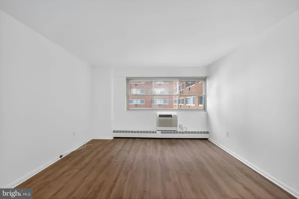 wooden floor in a room with window