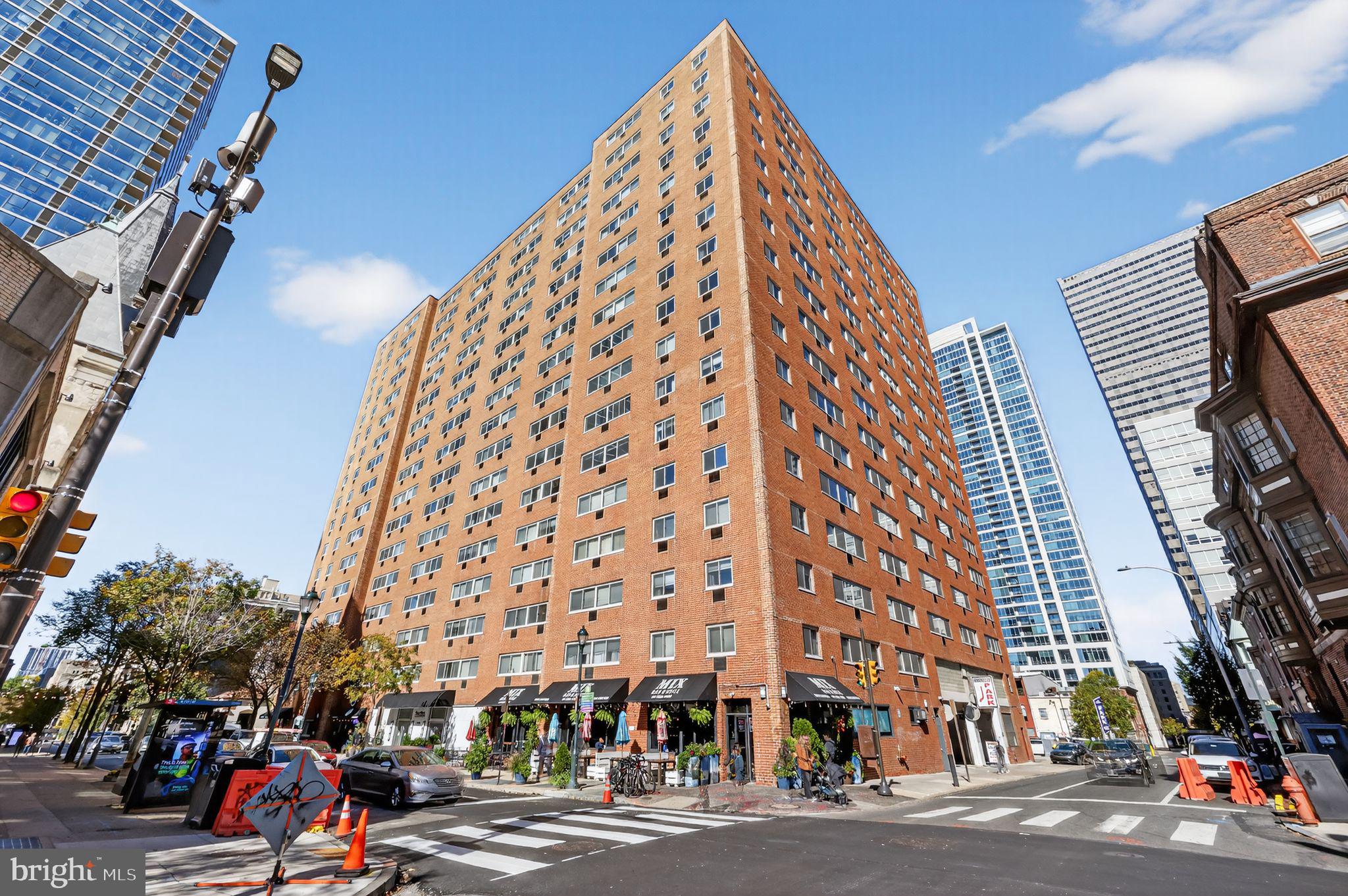 2101-17 Chestnut Street, Unit 1121 Philadelphia, PA 19103 - Photo 2 of 42 a view of a tall building next to a road