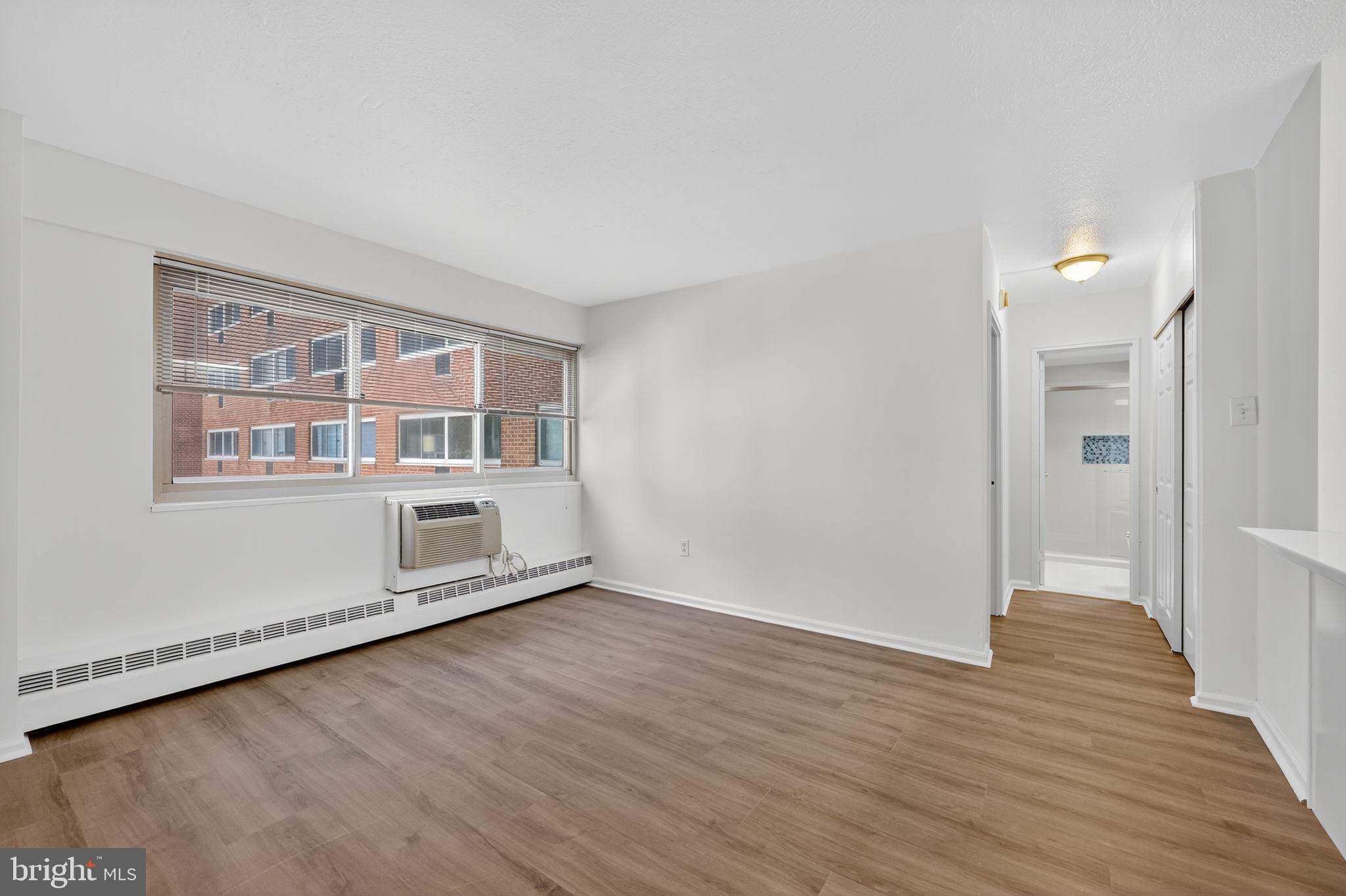 2101-17 Chestnut Street, Unit 1121 Philadelphia, PA 19103 - Photo 26 of 42 wooden floor in an empty room