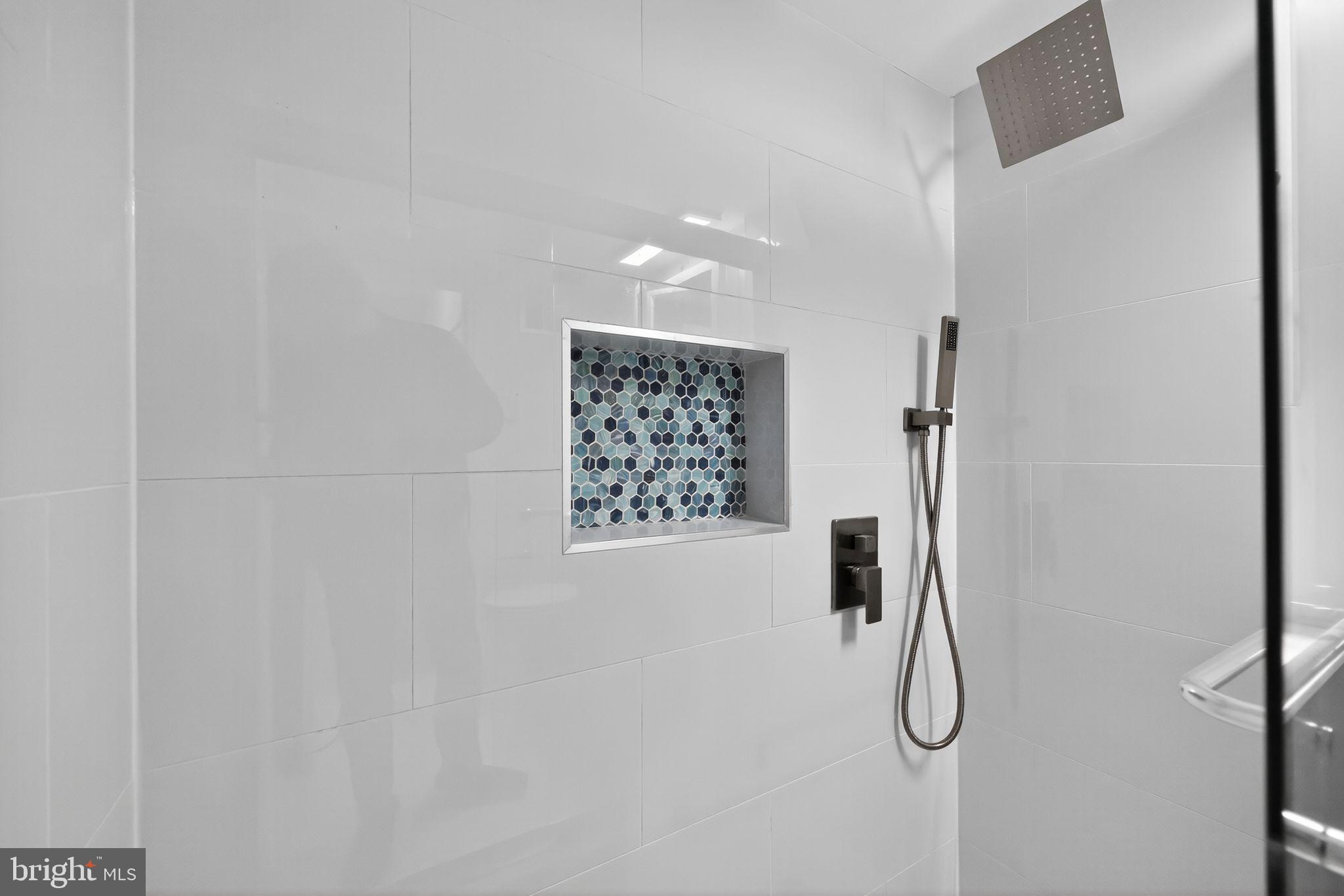 2101-17 Chestnut Street, Unit 1121 Philadelphia, PA 19103 - Photo 31 of 42 a picture of a bathroom with a shower