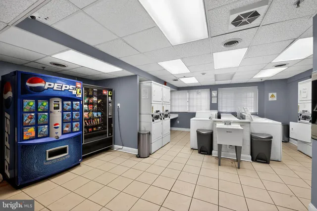 a large room with lots of furniture and clutter