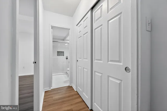 a view of a bathroom from the hallway