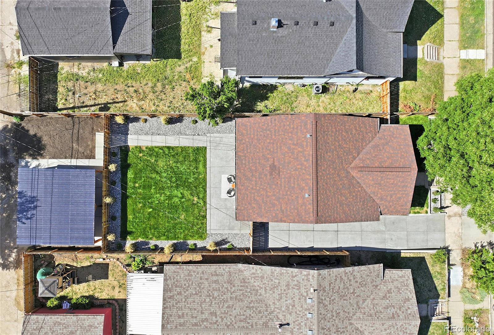 4545 Decatur Street Denver, CO 80211 - Photo 28 of 30 an aerial view of a house with a yard and potted plants