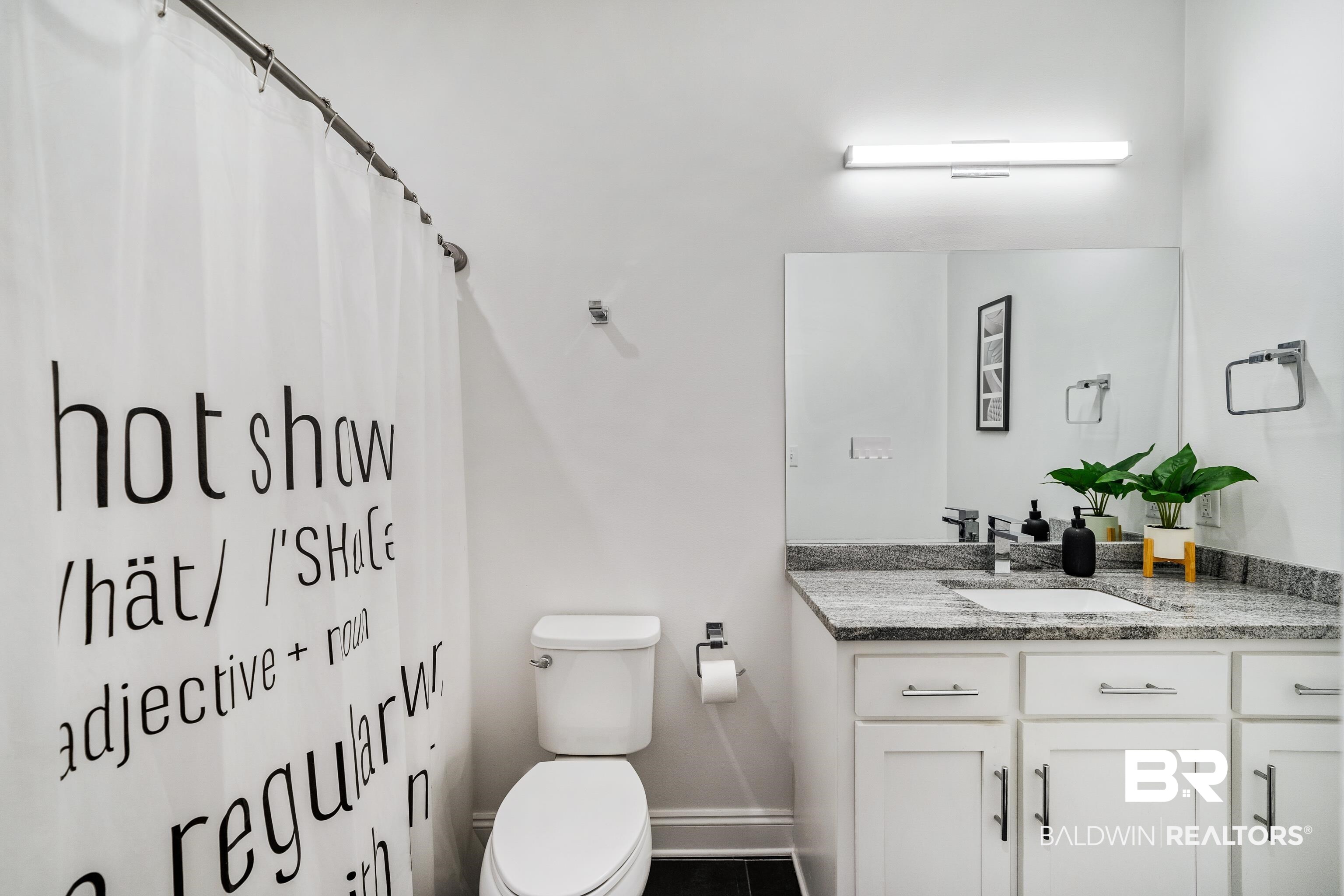 36784 Legacy Way Bay Minette, AL 36507 - Photo 36 of 57 Bathroom featuring vanity, toilet, and tub/shower combo