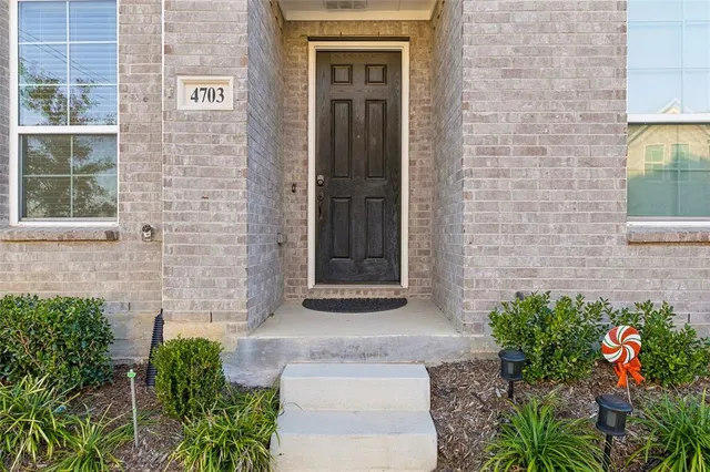 a front view of a house with an outdoor space
