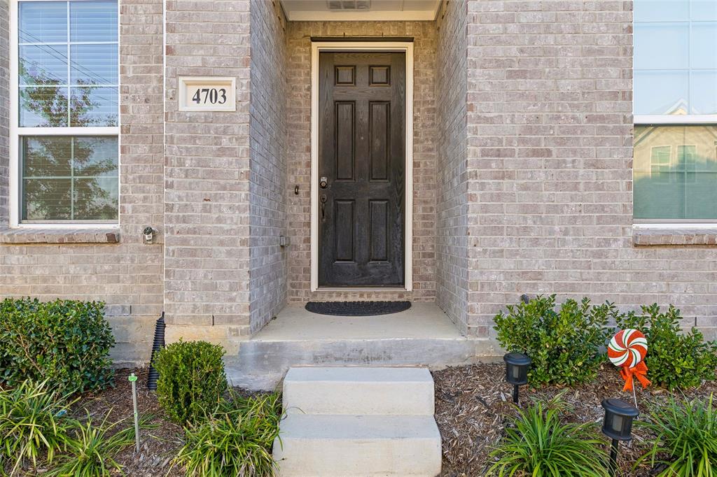 a front view of a house with an outdoor space