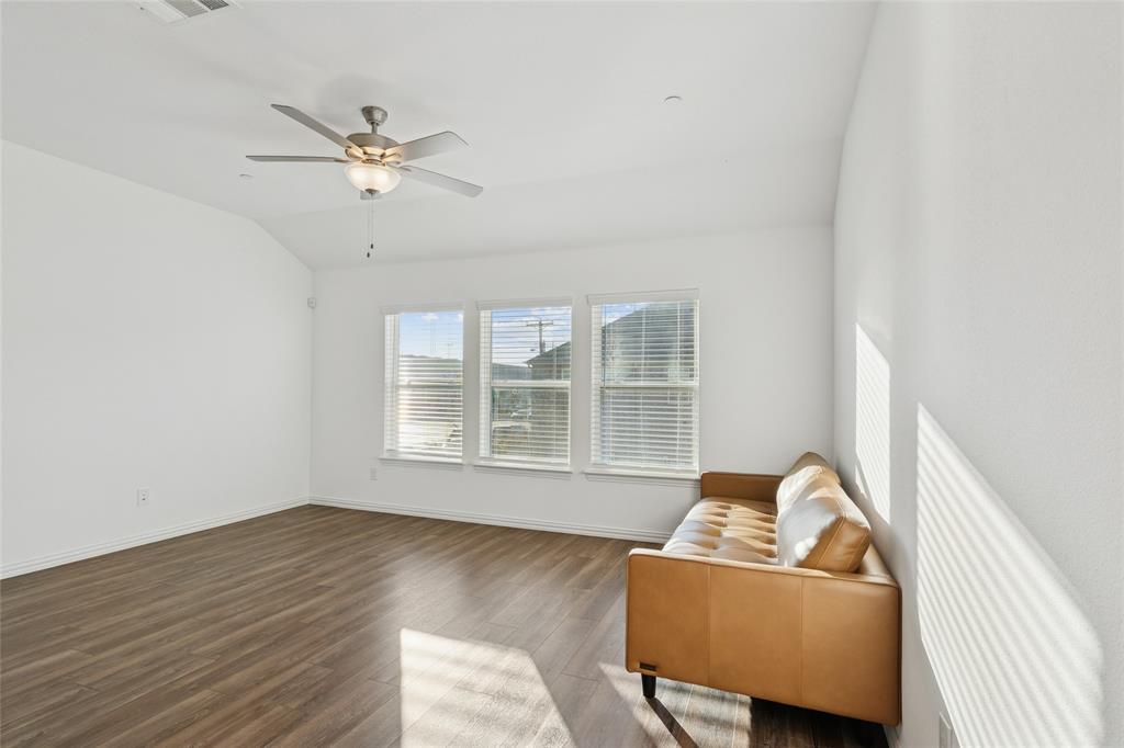 4703 Kindred Street Haltom City, TX 76117 - Photo 7 of 23 a living room with furniture and window