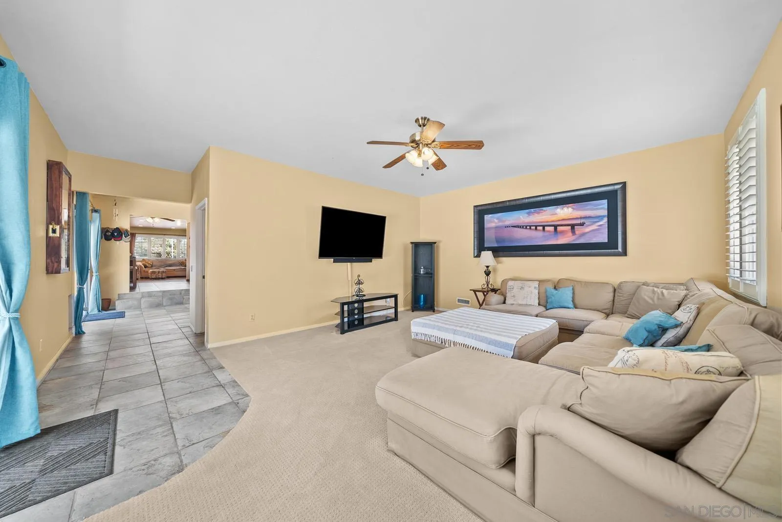 2327 Morro Road Fallbrook, CA 92028 - Photo 20 of 75 a living room with furniture and a flat screen tv