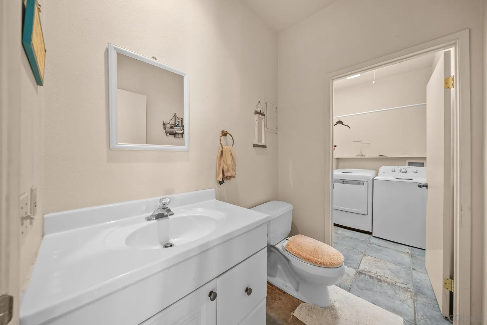 2327 Morro Road Fallbrook, CA 92028 - Photo 22 of 75 a bathroom with a sink toilet vanity and tub
