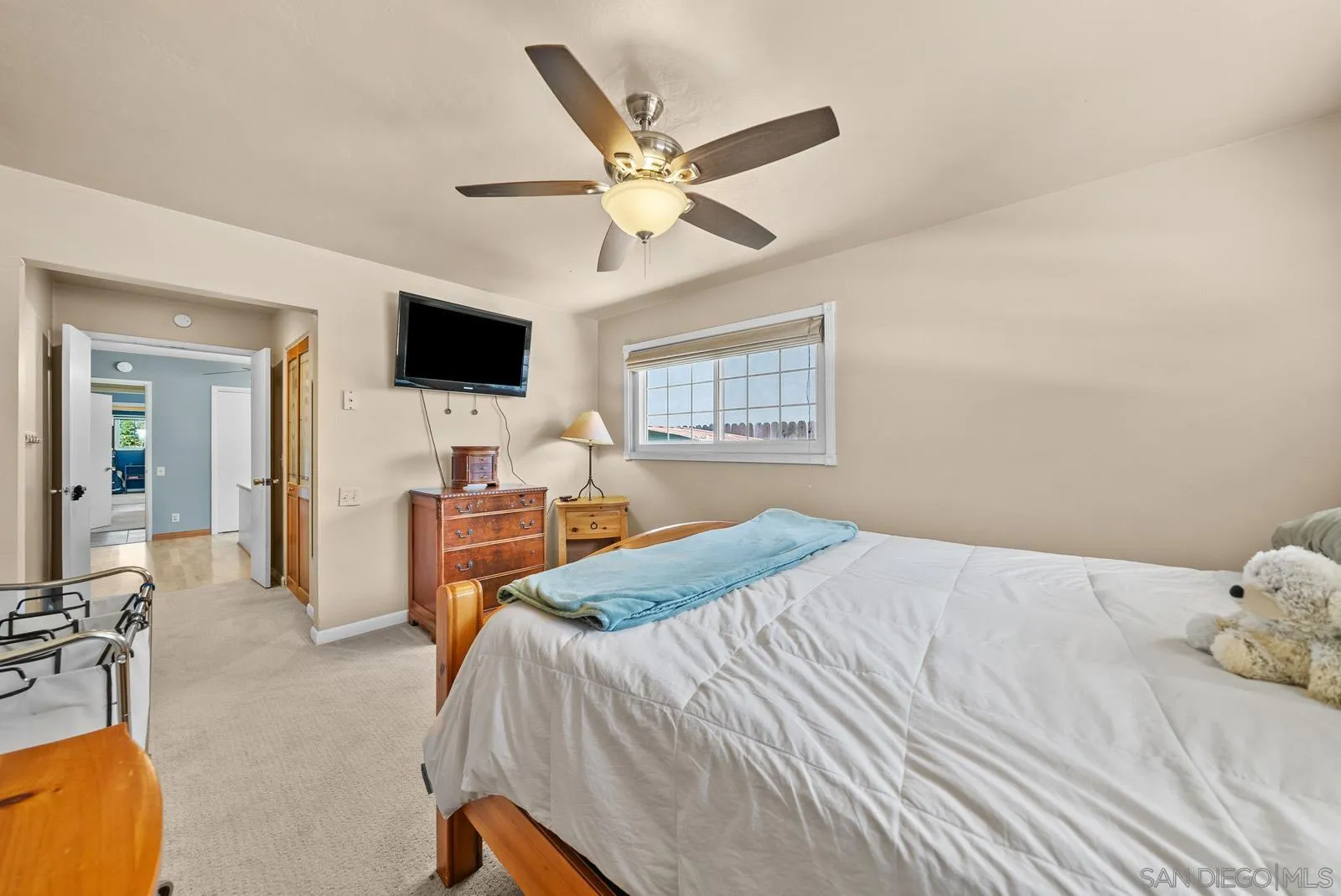 2327 Morro Road Fallbrook, CA 92028 - Photo 28 of 75 a bedroom with a bed and a flat screen tv