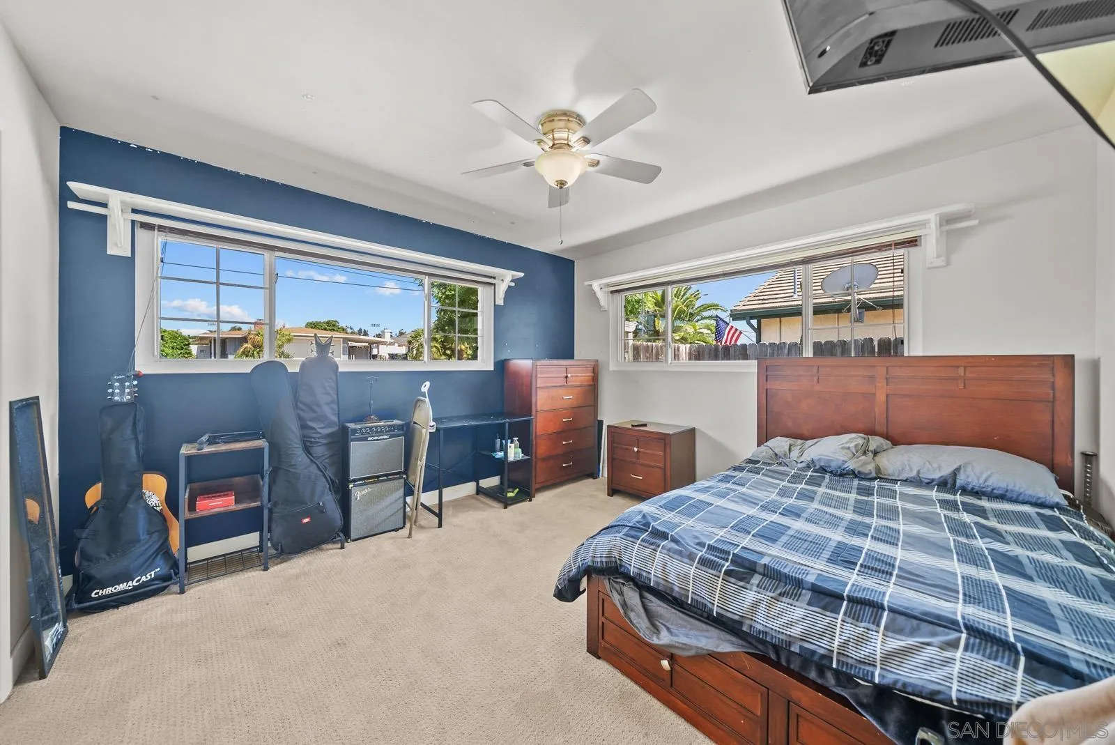 2327 Morro Road Fallbrook, CA 92028 - Photo 34 of 75 a bedroom with a bed and a chandelier