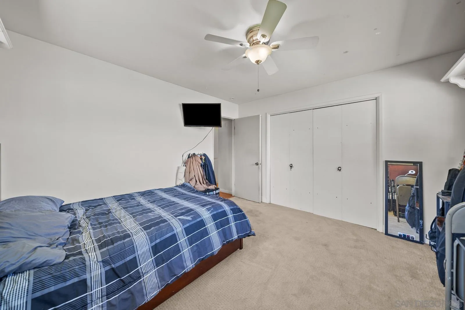 2327 Morro Road Fallbrook, CA 92028 - Photo 35 of 75 a bedroom with a bed and a ceiling fan
