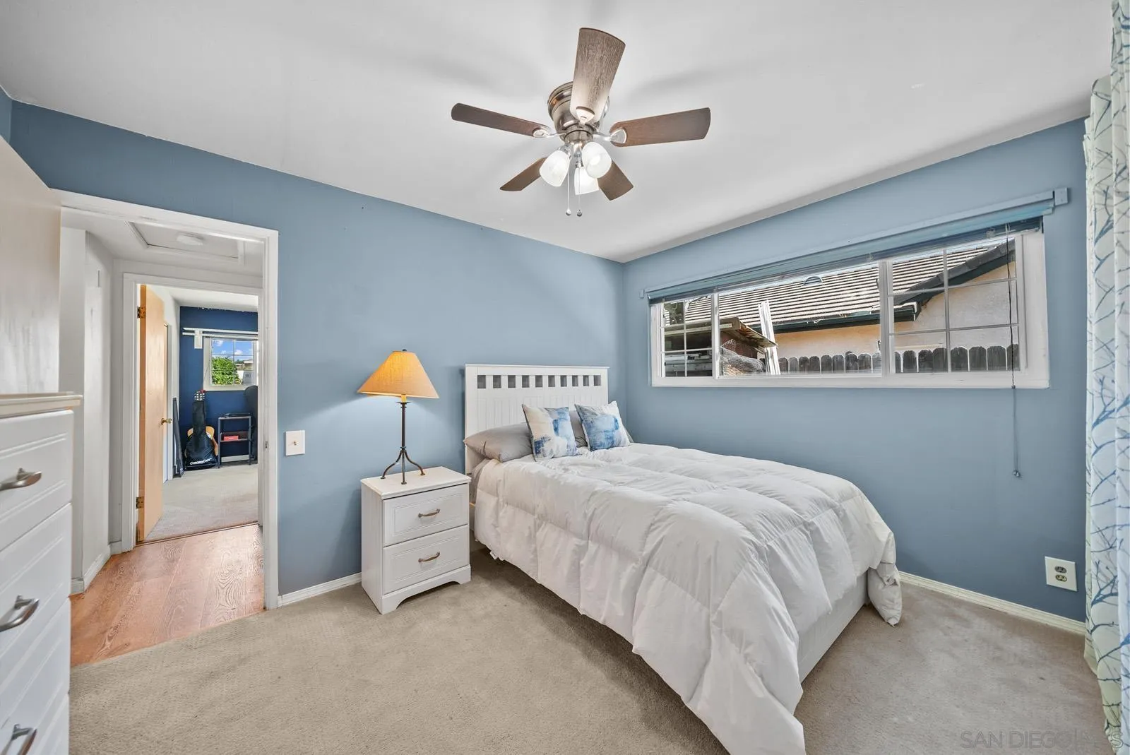 2327 Morro Road Fallbrook, CA 92028 - Photo 38 of 75 a bedroom with a bed and a chandelier