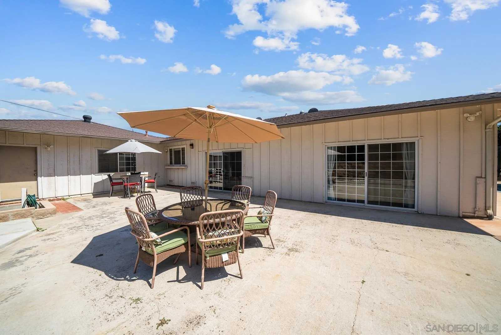 2327 Morro Road Fallbrook, CA 92028 - Photo 44 of 75 a patio with a table and chairs