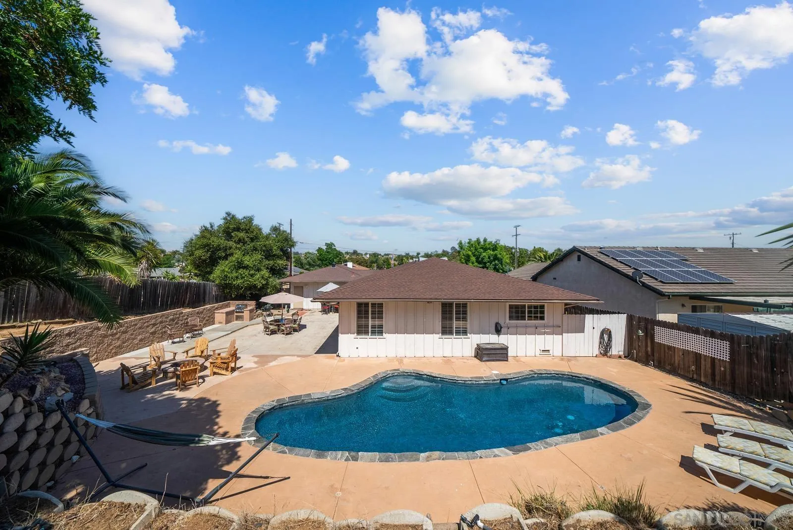 2327 Morro Road Fallbrook, CA 92028 - Photo 56 of 75 a view of a house with backyard outdoor seating and kitchen