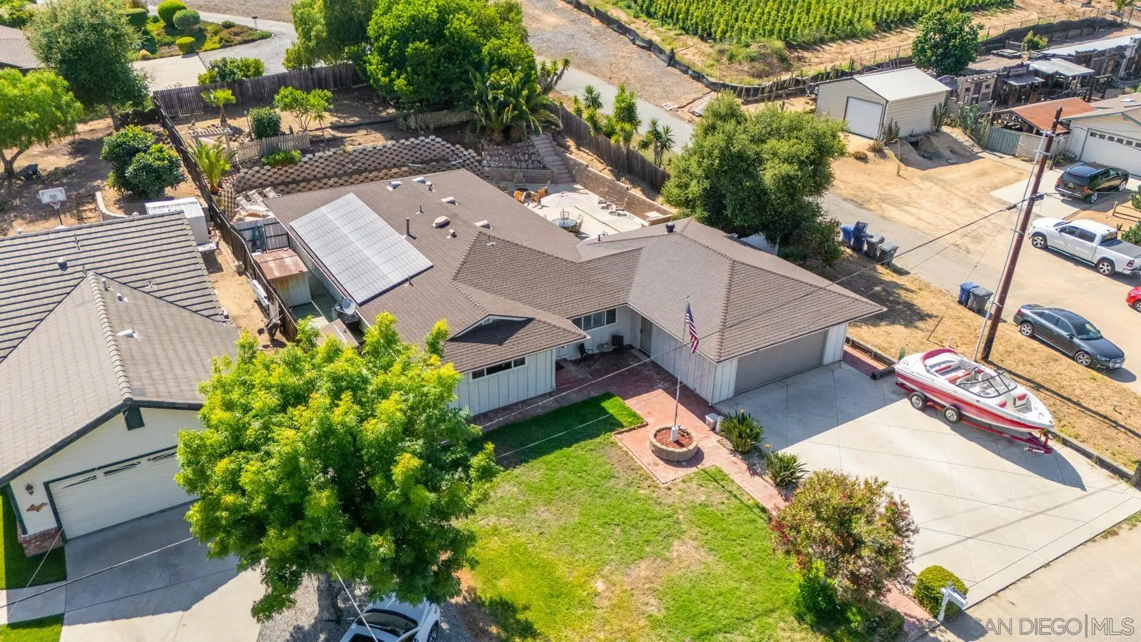 2327 Morro Road Fallbrook, CA 92028 - Photo 63 of 75 an aerial view of a house with a yard and garden