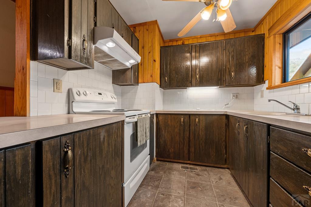9600 Middle Creek Canyon Road Beulah, CO 81023 - Photo 14 of 50 a kitchen with a sink and cabinets