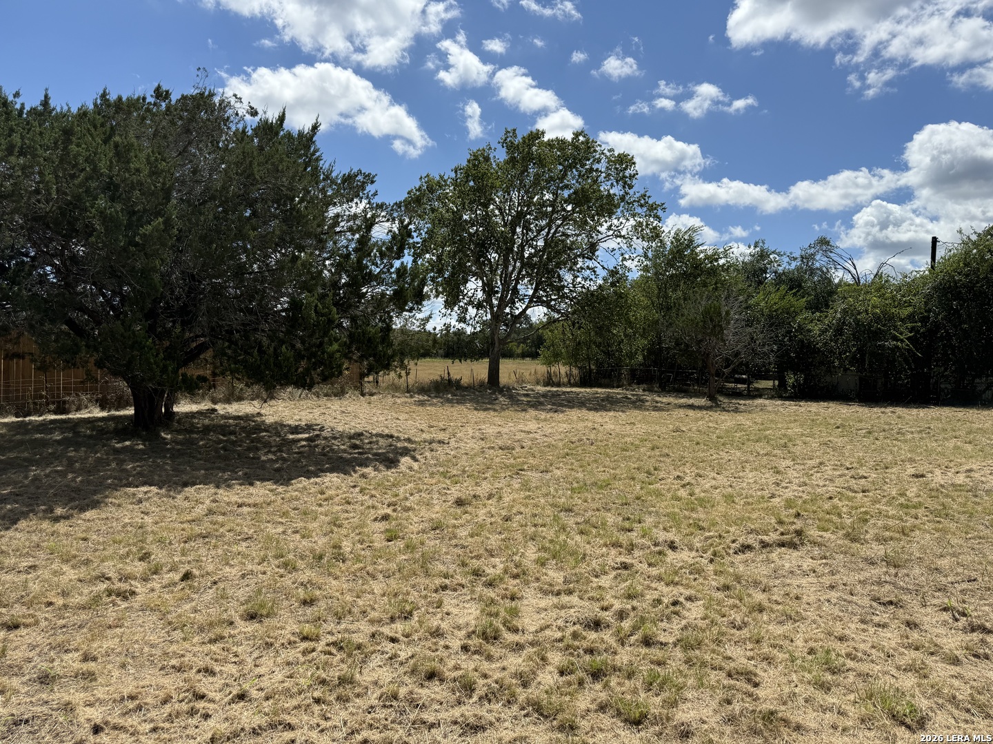 a view of yard covered with snow in outdoor space