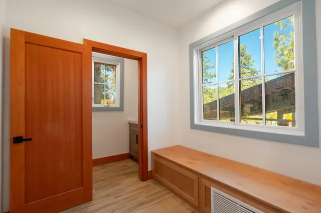 a view of a door and a window