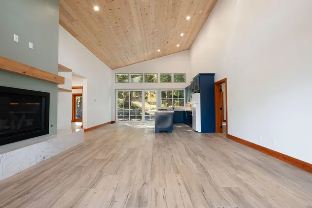 a bathroom with a sink a mirror and a toilet