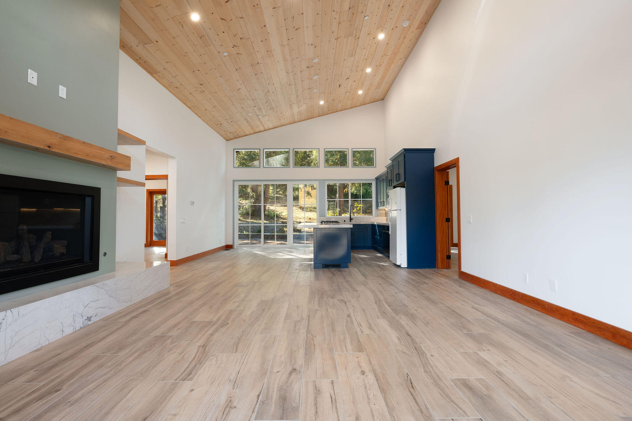 53091 Tollgate Road Idyllwild, CA 92549 - Photo 16 of 49 a view of a livingroom with furniture and a fireplace