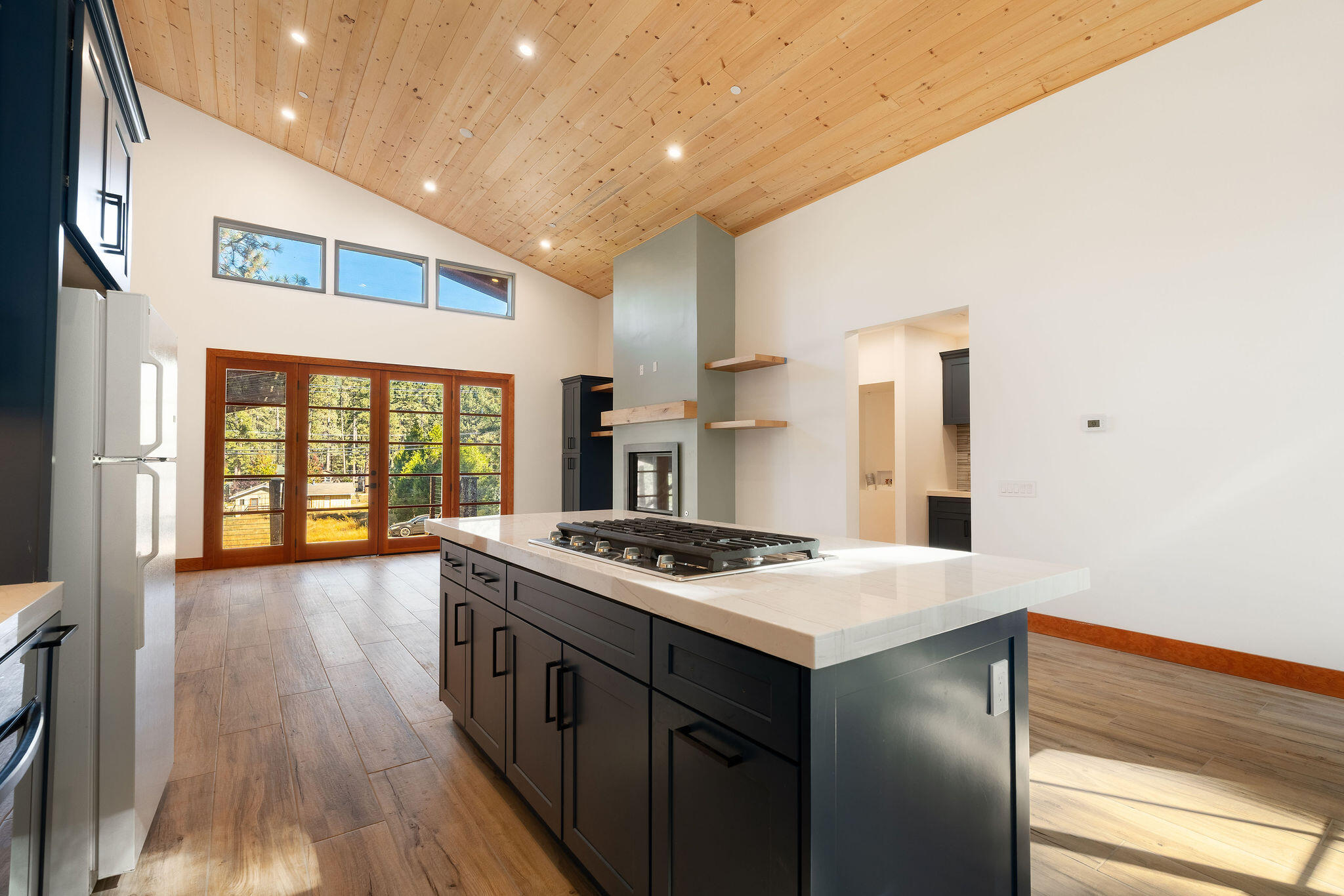53091 Tollgate Road Idyllwild, CA 92549 - Photo 24 of 49 a kitchen with stainless steel appliances granite countertop a stove and a sink