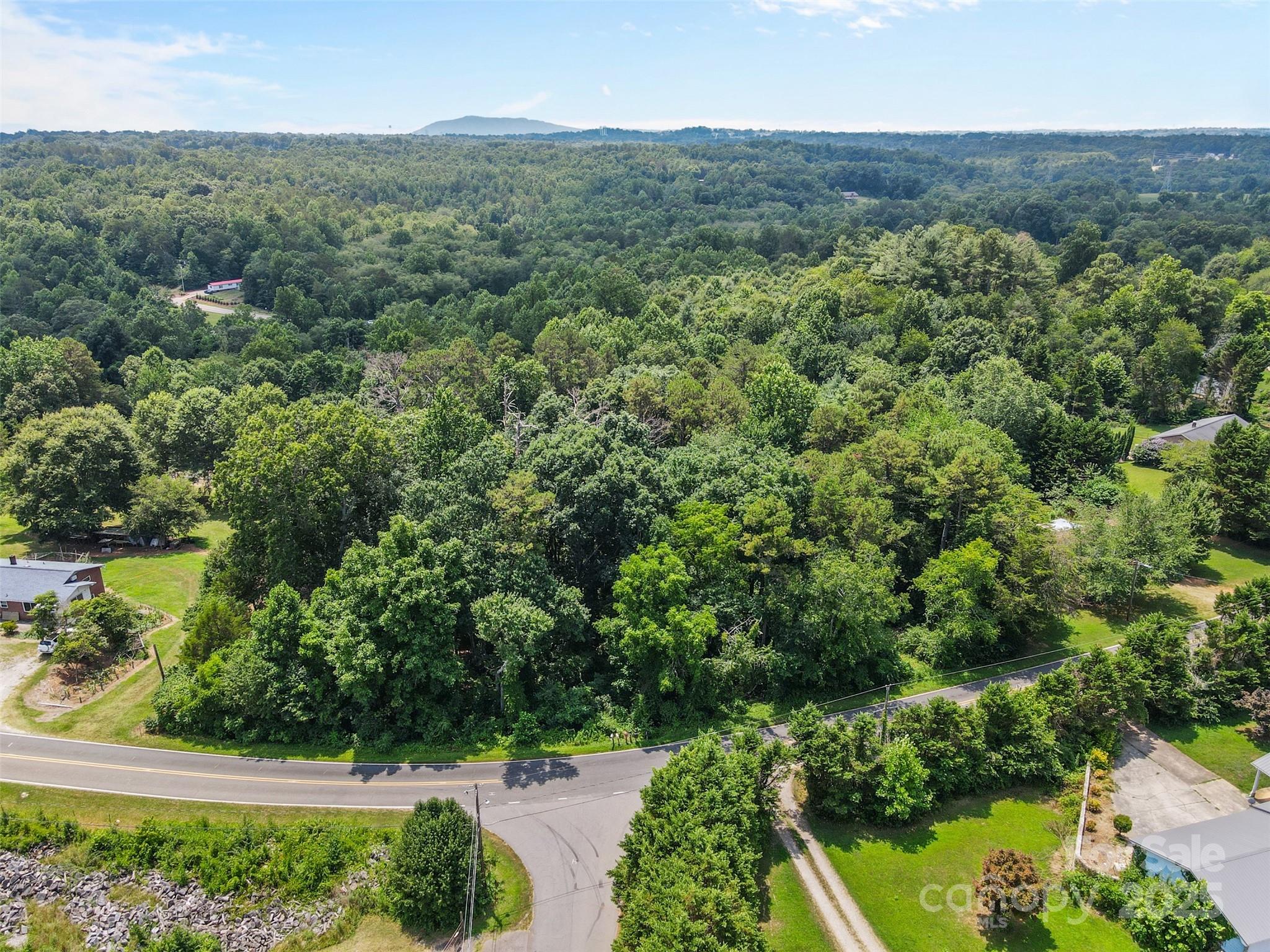 0 Liberty Church Road Hickory, NC 28601 - Photo 2 of 11 an aerial view of residential house with outdoor space and trees all around